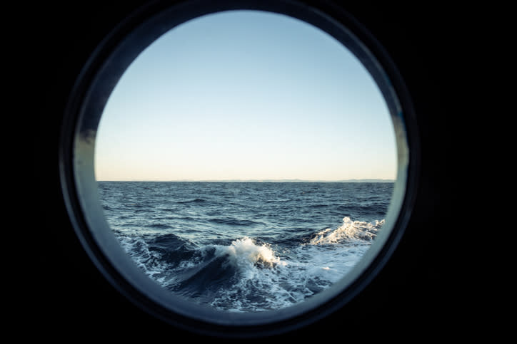 view from a ship's window of the ocean