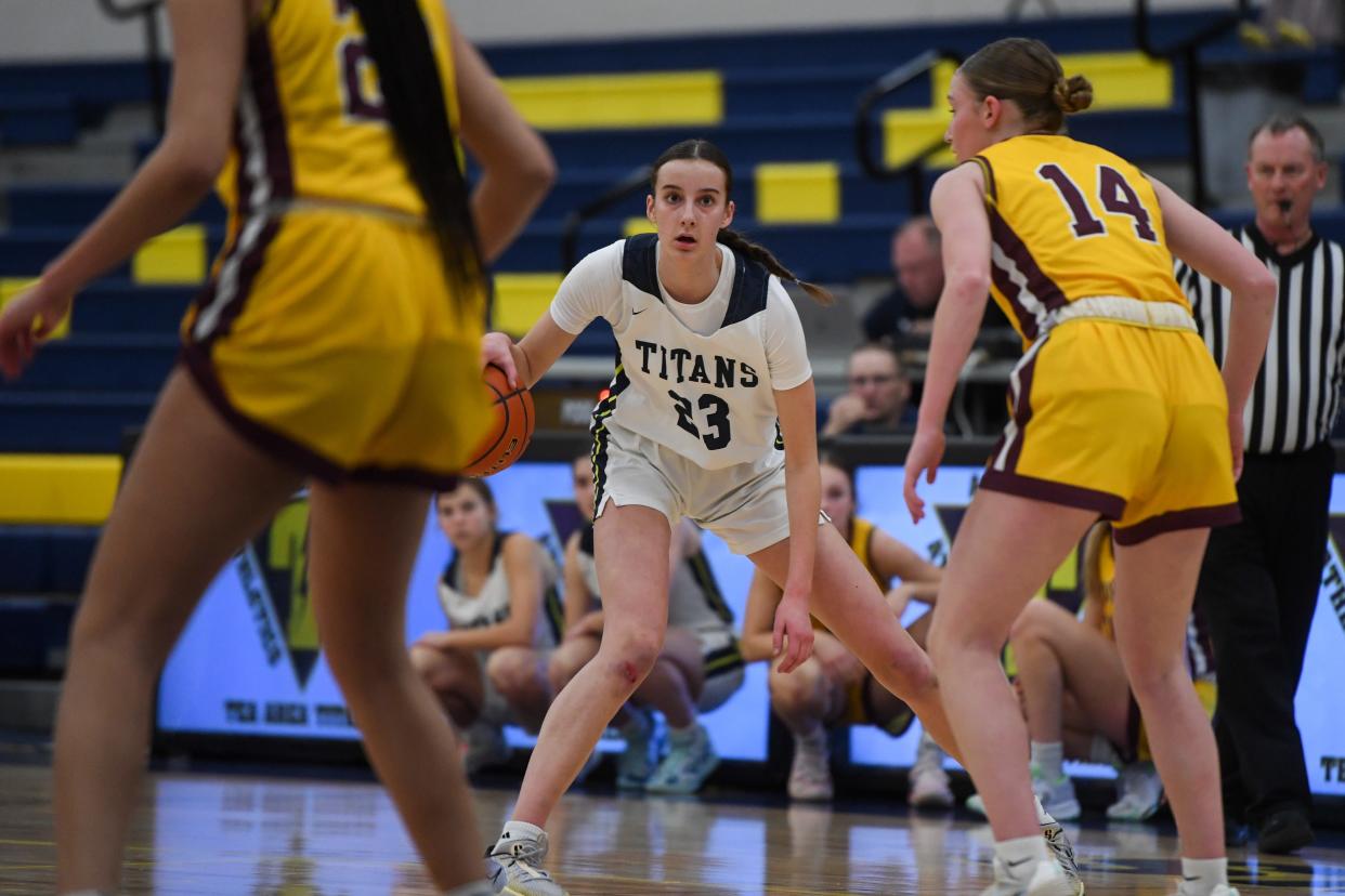 Tea’s guard Katie Vasecka (23) looks to pass during the second quarter on Tuesday, Feb. 6, 2024 at Tea High School in Tea.