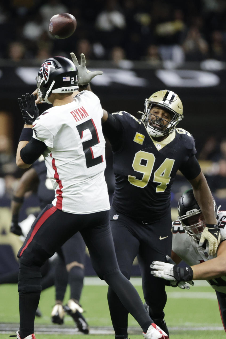 New Orleans Saints defensive end Cameron Jordan (94) pressures Atlanta Falcons quarterback Matt Ryan (2) during the second half of an NFL football game, Sunday, Nov. 7, 2021, in New Orleans. (AP Photo/Derick Hingle)