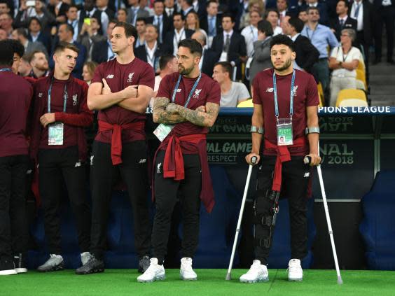 Alex Oxlade-Chamberlain watches on from the sidelines during last year's Champions League final (Getty)