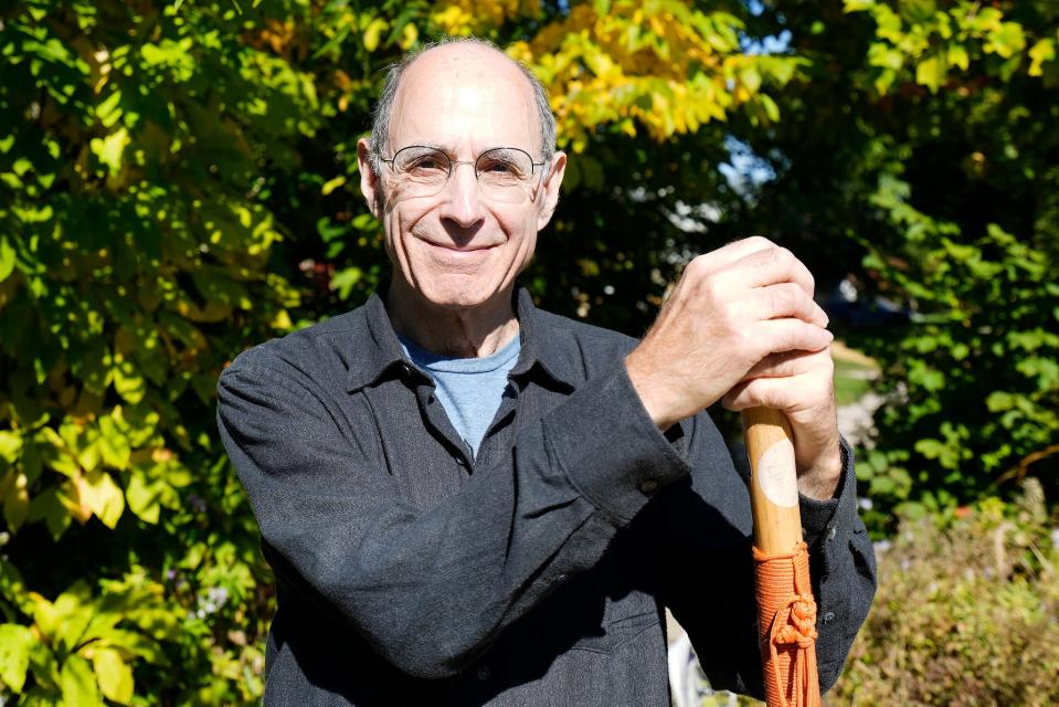 Ed Sternberg is seen outside of his home in Wauwatosa. Sternberg has maintained his yard to display more than 170 plant and tree species, including many native plants. The City of Wauwatosa is saying his yard is not up to code.