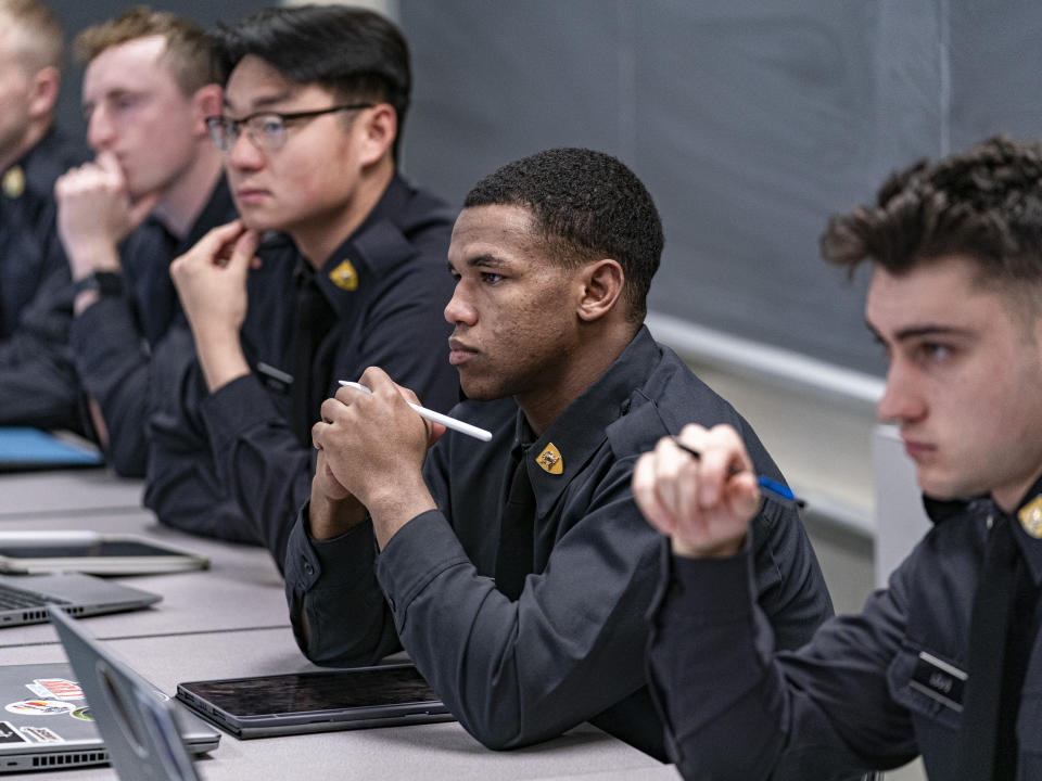 Cadets participate in a class on American politics at the United States Military Academy in West Point, N.Y., Wednesday, Nov. 29, 2023. (AP Photo/Peter K. Afriyie)