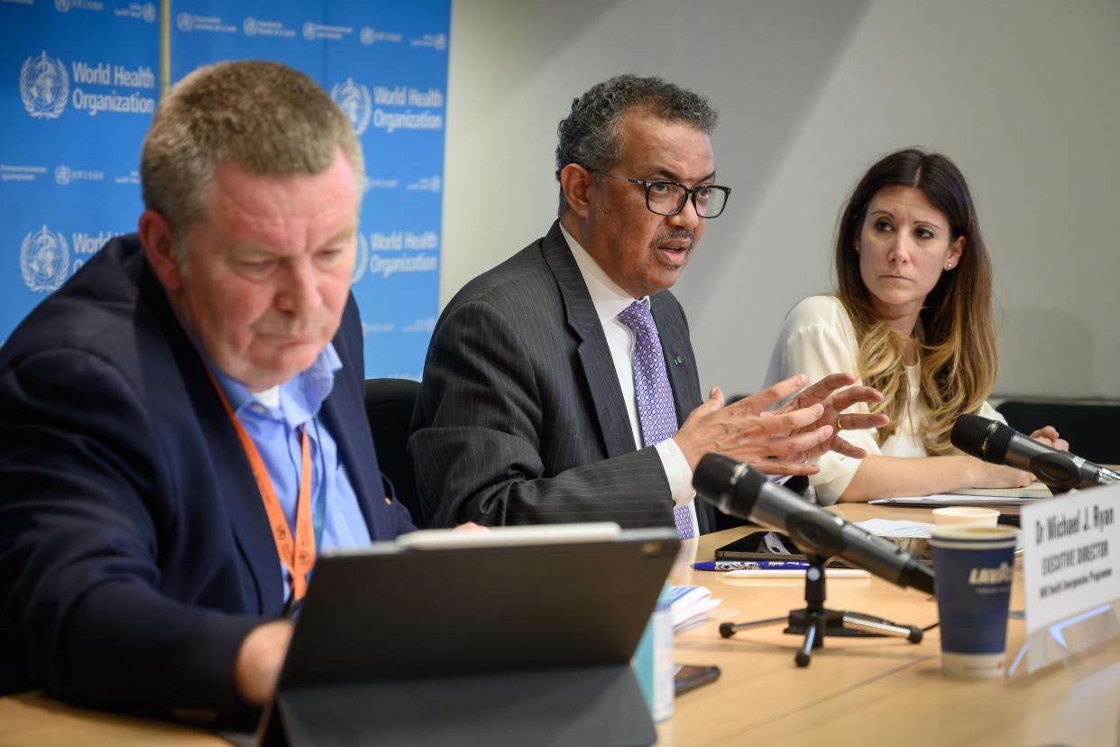 World Health Organization (WHO) Director-General Tedros Adhanom Ghebreyesus (C) speaks past WHO Health Emergencies Programme Director Michael Ryan (L) and WHO Technical Lead Maria Van Kerkhove during a daily press briefing on COVID-19 virus at the WHO headquaters in Geneva on March 9, 2020. - The World Health Organization said on March 9, 2020 that more than 70 percent of those infected with the new coronavirus in China have recovered, adding that the country was "bringing its epidemic under control". (Photo by Fabrice COFFRINI / AFP) (Photo by FABRICE COFFRINI/AFP via Getty Images)