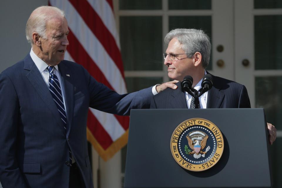 President-elect Joe Biden has reportedly chosen federal appeals court judge Merrick Garland as his attorney general.  Seen here, then Vice President Joe Biden congratulates Judge Merrick Garland after he was nominated by President Barack Obama to the Supreme Court in the Rose Garden at the White House, March 16, 2016 in Washington, DC. 