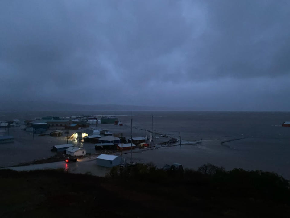 This photo provided by Clarabelle Lewis shows flooding early Saturday morning, Sept. 17, 2022, in Golovin, Alaska. Much of Alaska's western coast could see flooding and high winds as the remnants of Typhoon Merbok moved into the Bering Sea region. The National Weather Service says some locations could experience the worst coastal flooding in 50 years. (Clarabelle Lewis via AP)