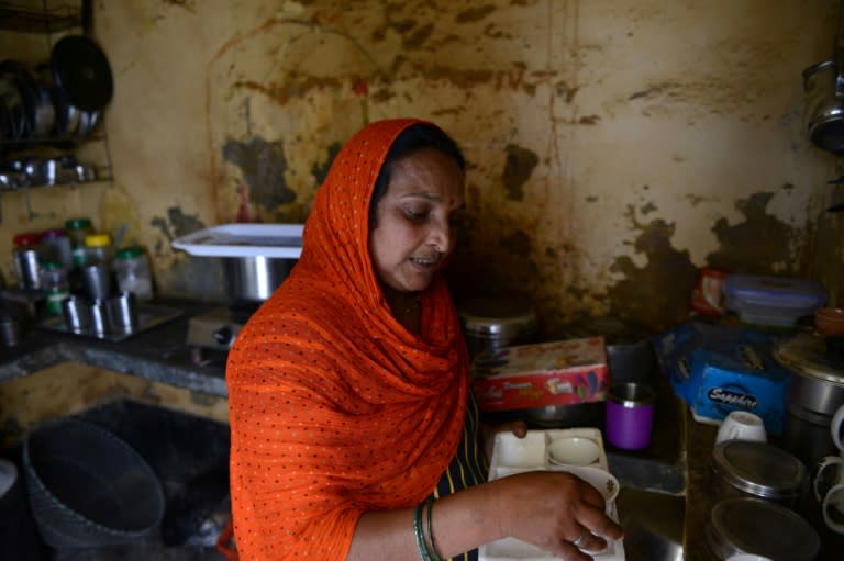 Kiran Rana, mother of one of 14 men arrested for lynching a Muslim villager in Uttar Pradesh, supports the state's new hardline Hindu head, recently appointed by Prime Minister Modi