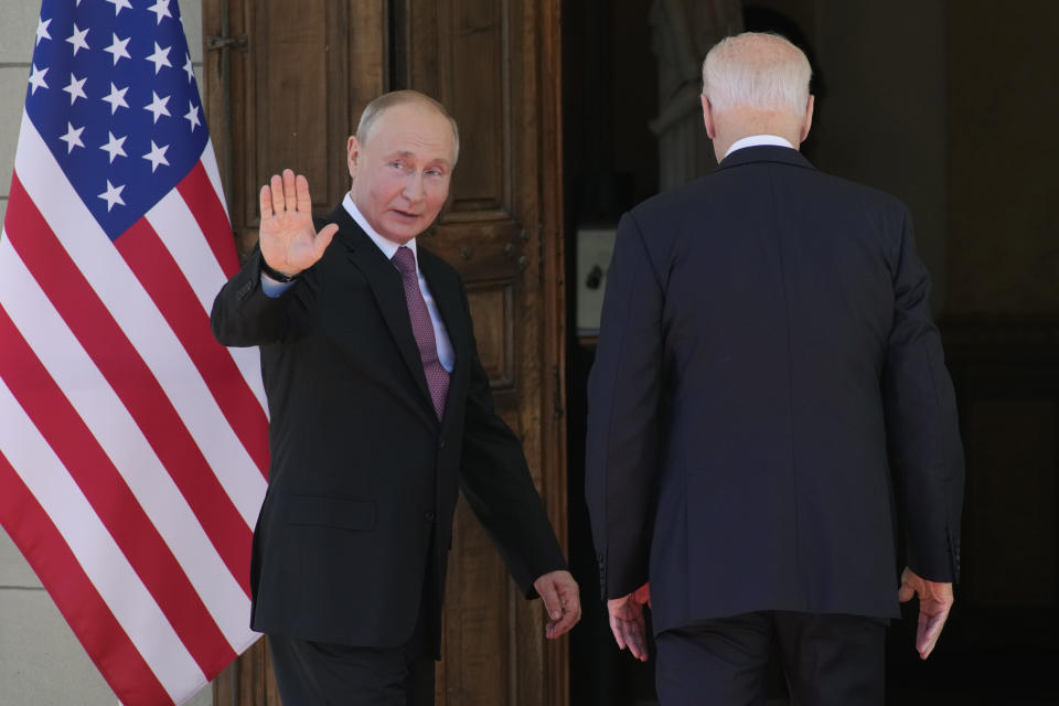 Russian President Vladimir Putin, left, and U.S President Joe Biden enter the 'Villa la Grange' in Geneva, Switzerland in Geneva, Switzerland, Wednesday, June 16, 2021. (AP Photo/Alexander Zemlianichenko, Pool)