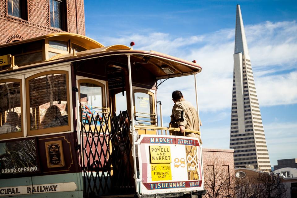 Transamerica Pyramid and Cable Car on Powell and California Street San Francisco California USA