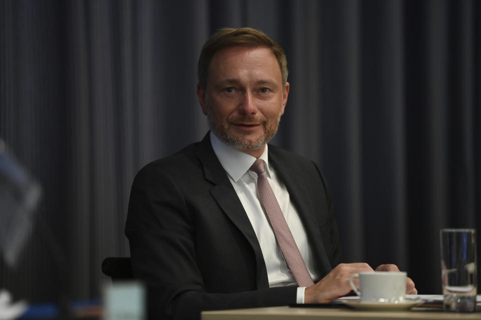 Germany's Free Democrats chairman Christian Lindner attends a meeting of his party at the headquarters in Berlin, Germany, Monday, Sept. 27, 2021. Following Sunday's election leaders of the German parties were meeting Monday to digest a result that saw Merkel’s Union bloc slump to its worst-ever result in a national election and appeared to put the keys to power in the hands of two opposition parties. Both Social Democrat Olaf Scholz and Armin Laschet, the candidate of Merkel's party, laid a claim to leading the next government. (Sebastian Kahnert/dpa via AP)