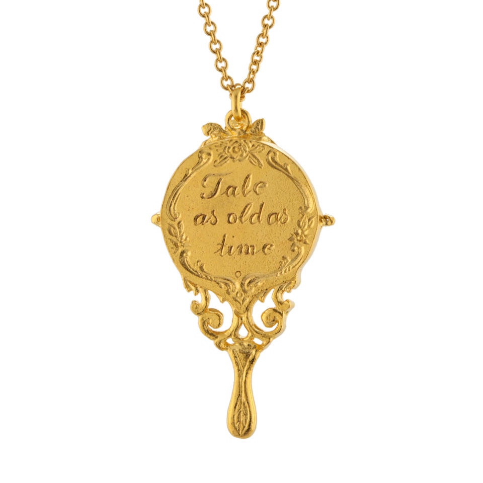 <p>Baroque Hand Mirror Necklace engraved with "Tale as Old as Time", gold-plated with silver detail, £180</p>