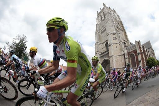 Germany's Dominik Nerz (C) rides past a church with Great Britain's Mark Cavendish (L) during the 197 km and third stage of the 2012 Tour de France cycling race starting in Orchies and finishing in Boulogne-sur-Mer, northern France. Slovakian champion Peter Sagan continued his impressive start to his Tour de France debut with his second stage win inside three days on Tuesday