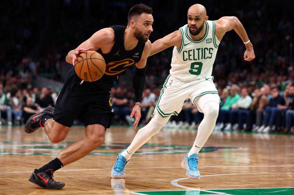 Cavs wing Max Strus drives against Derrick White of the Celtics in Game 1 of the Eastern Conference semifinals, May 7, 2024, in Boston.