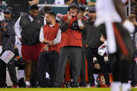Tampa Bay Buccaneers head coach Bruce Arians claps during the first half of an NFL football game against the Philadelphia Eagles on Thursday, Oct. 14, 2021, in Philadelphia. (AP Photo/Matt Slocum)