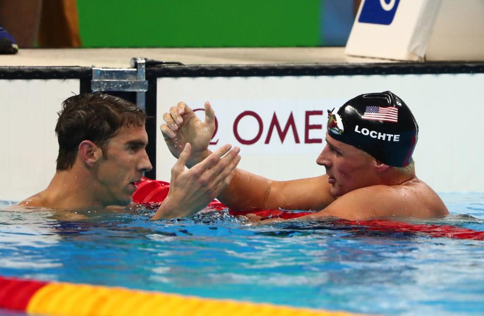 Michael Phelps and Ryan Lochte after the men's 200 individual medley final in the Rio 2016 Summer Olympic Games at Olympic Aquatics Stadium.