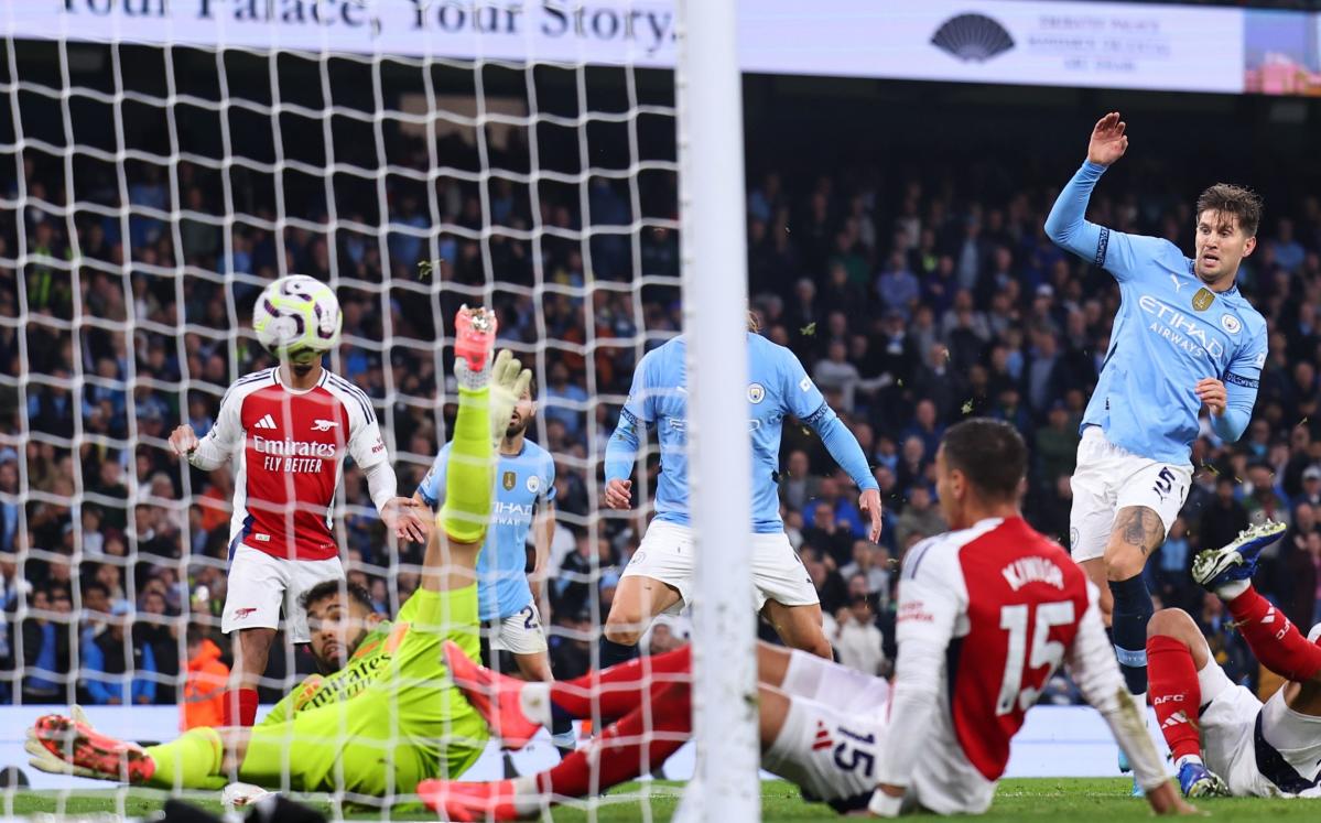 Arsenal’s 10 men denied statement win by last-gasp Man City equaliser