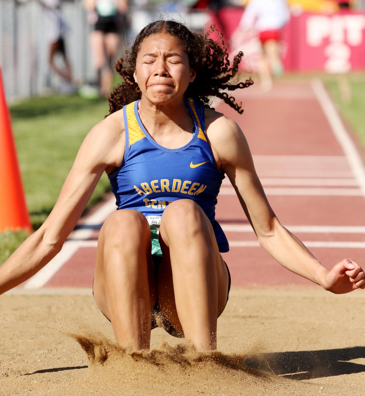 Aberdeen Central's Ciara Frank hits the landing pit in the Class AA girls' long jump during the 2022 South Dakota State Track and Field Championships at Sioux Falls.