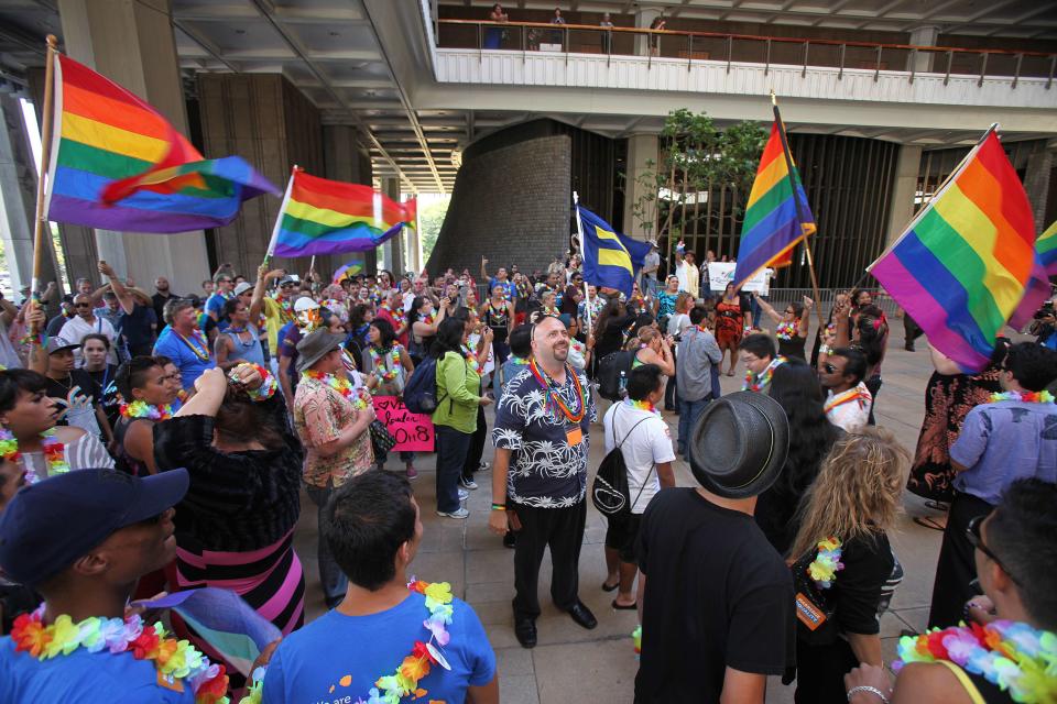 Supporters of same-sex marriage celebrate after the Hawaii State Senate approved a bill allowing same sex marriage to be legal in the state of Hawaii, in Honolulu