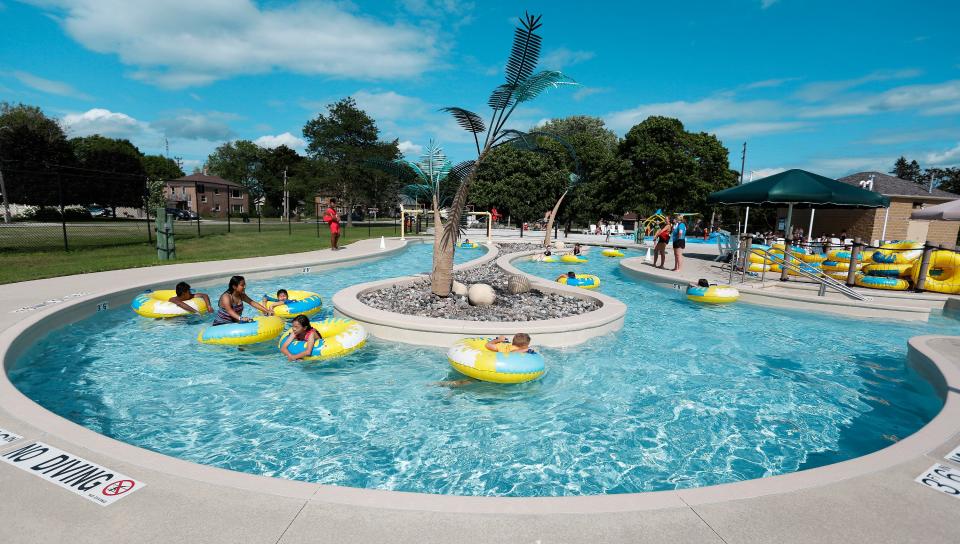 Youngsters float along the cool waters at the Manitowoc Family Aquatic Center, Wednesday, July 20, 2022, in Manitowoc, Wis.