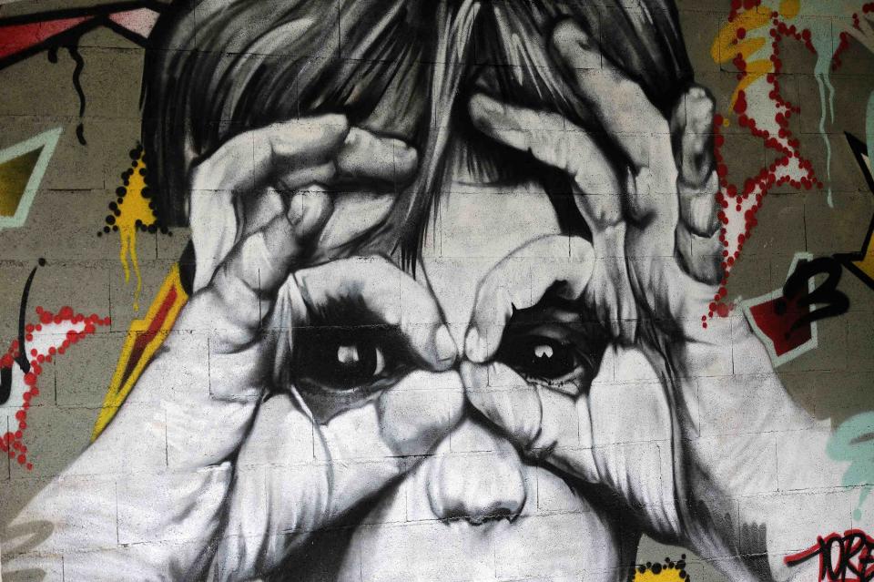 A wall painted by French street artist Tore is seen at the street art project tower "Paris Tour 13" in Paris