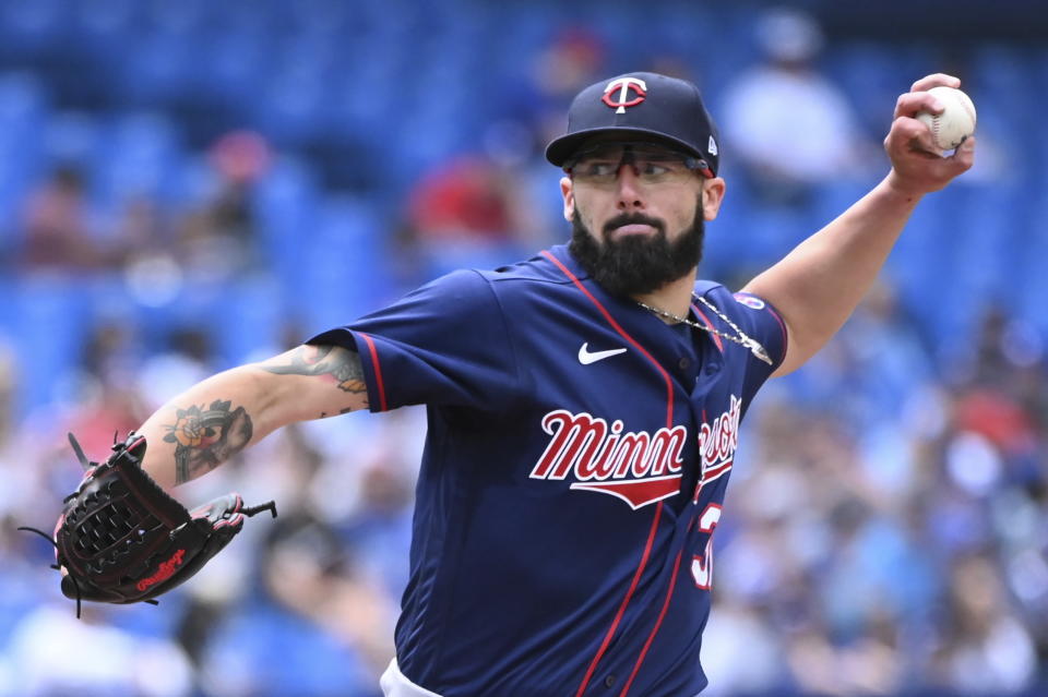 Minnesota Twins starting pitcher Devin Smeltzer throws to a Toronto Blue Jays batter in the first inning of a baseball game in Toronto, Sunday, June 5, 2022. (Jon Blacker/The Canadian Press via AP)