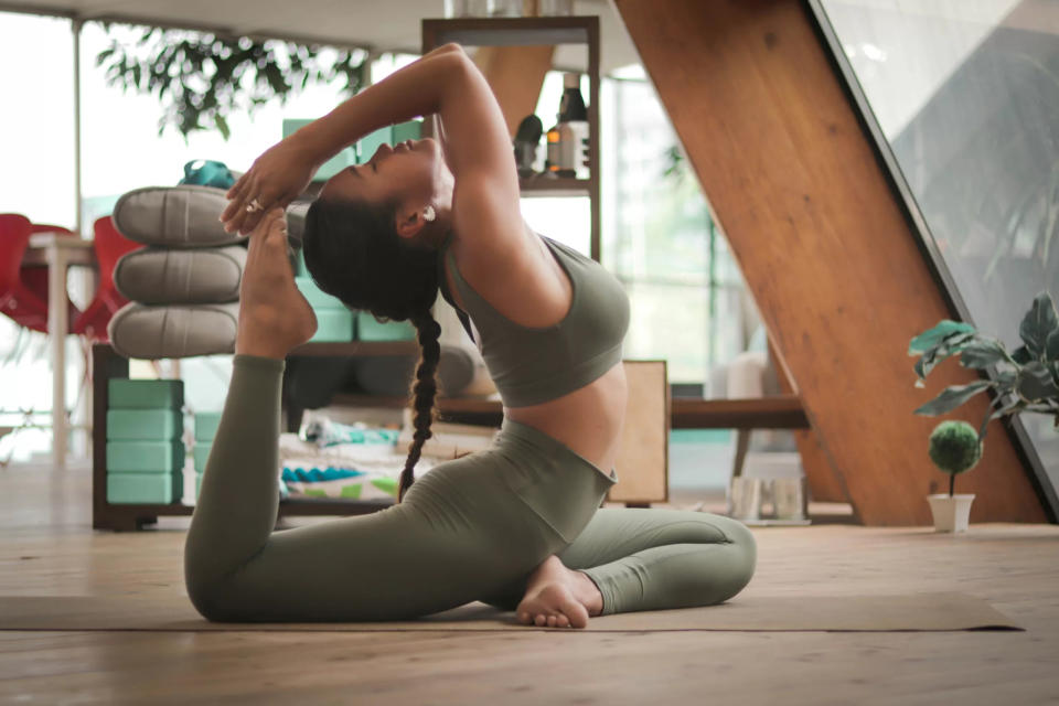 yoga studio in singapore - woman doing yoga