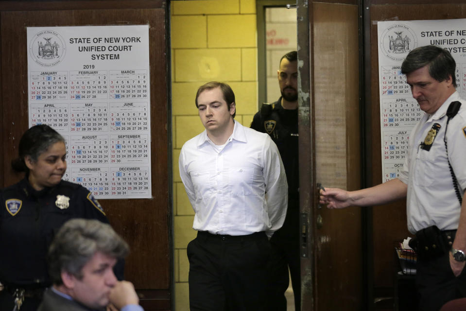 James Jackson appears in court for sentencing in New York, Wednesday, Feb. 13, 2019. Jackson, a white supremacist, pled guilty to killing a black man with a sword as part of a racist plot that prosecutors described as a hate crime and was sentenced to life in prison without parole. (AP Photo/Seth Wenig)