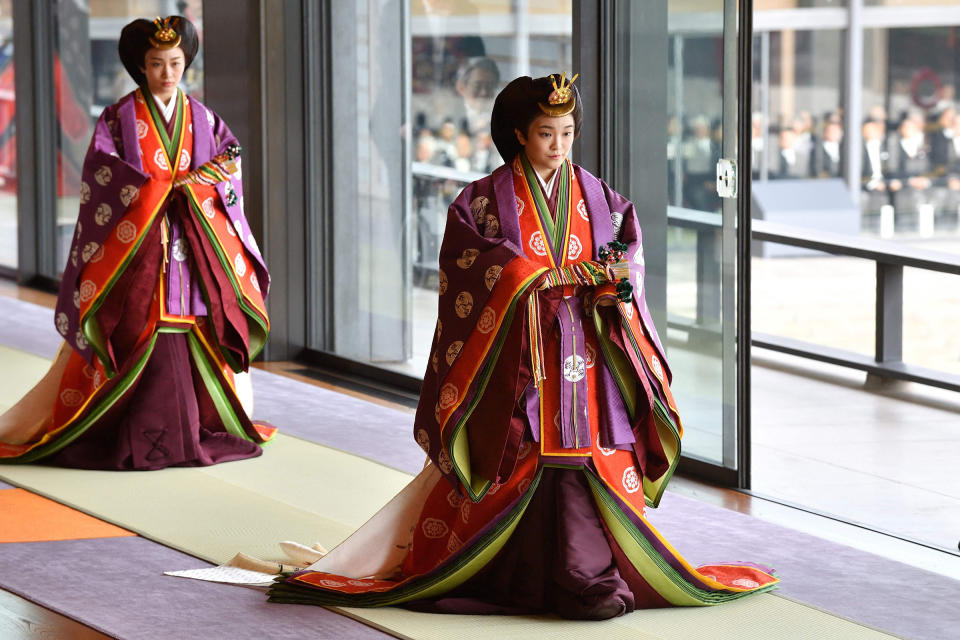 Princess Mako, right, attends the enthronement ceremony where Emperor Naruhito officially proclaimed his ascension to the Chrysanthemum Throne, at the Imperial Palace, Tokyo, in Oct. 2019.<span class="copyright">Kazuhiro Nogi—Pool/AFP/Getty Images</span>