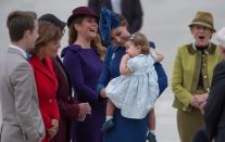 The Duchess of Cambridge, centre, holds her daughter Princess Charlotte as she speaks with British Columbia Premier Christy Clark, second left, while Prime Minister Justin Trudeau’s wife Sophie Gregoire Trudeau, back, and Governor General David Johnston’s wife Sharon share a laugh, upon the family’s arrival in Victoria, B.C., on Saturday, September 24, 2016. Photo: THE CANADIAN PRESS/Darryl Dyck