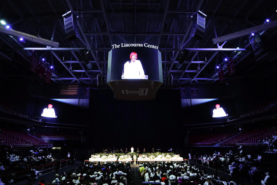 Sallie Thomas speaks during funeral services for the victims of a deadly row house fire, at Temple University in Philadelphia, Monday, Jan. 17, 2022. Officials say it was the city's deadliest single fire in at least a century. (AP Photo/Matt Rourke)