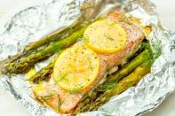 <p>These super-fresh salmon grill packs make clean-up a breeze.</p><p>Get the <a href="https://www.delish.com/uk/cooking/recipes/a29205113/foil-pack-grilled-salmon-with-lemony-asparagus-recipe/" rel="nofollow noopener" target="_blank" data-ylk="slk:Foil Pack Grilled Salmon with Lemony Asparagus;elm:context_link;itc:0;sec:content-canvas" class="link ">Foil Pack Grilled Salmon with Lemony Asparagus</a> recipe.</p>