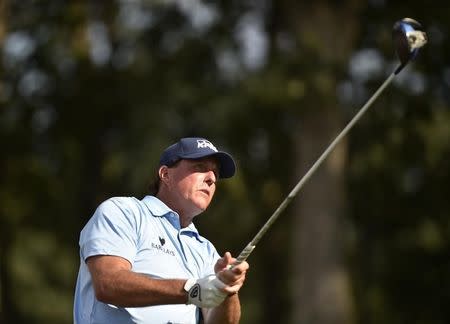 Aug 26, 2016; Farmingdale, NY, USA; Phil Mickelson watches his tee shot on the 12th hole during the second round of The Barclays golf tournament at Bethpage State Park - Black Course. Eric Sucar-USA TODAY Sports
