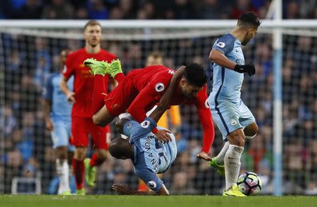 Britain Soccer Football - Manchester City v Liverpool - Premier League - Etihad Stadium - 19/3/17 Manchester City's Fernandinho in action with Liverpool's Emre Can Action Images via Reuters / Jason Cairnduff Livepic