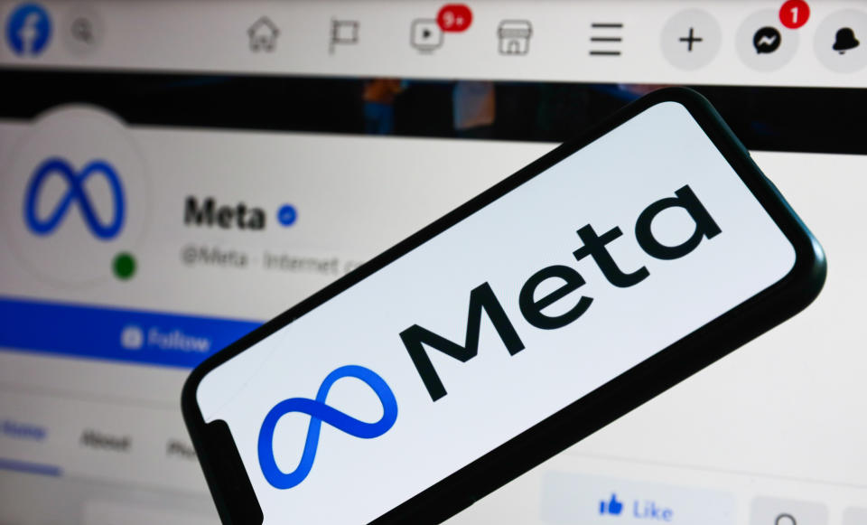 Meta logo displayed on a phone screen and Meta page on Facebook displayed on a laptop screen are seen in this illustration photo taken in Krakow, Poland on October 29, 2021. (Photo by Jakub Porzycki/NurPhoto via Getty Images)