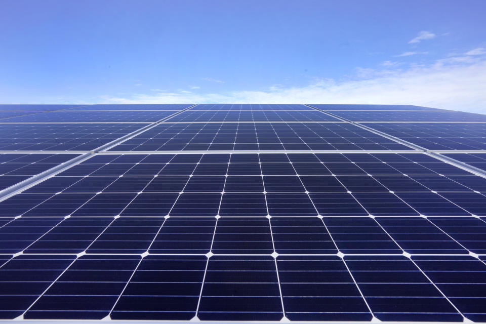 Solar panels face the sky on Tuesday Jan. 26, 2021, in Burrillville, R.I., at ISM Solar's 10-acre solar farm which is the first of its kind in the state. President Joe Biden wants to change the way the U.S. uses energy by expanding renewables, but faces several challenges. (AP Photo/Elise Amendola)