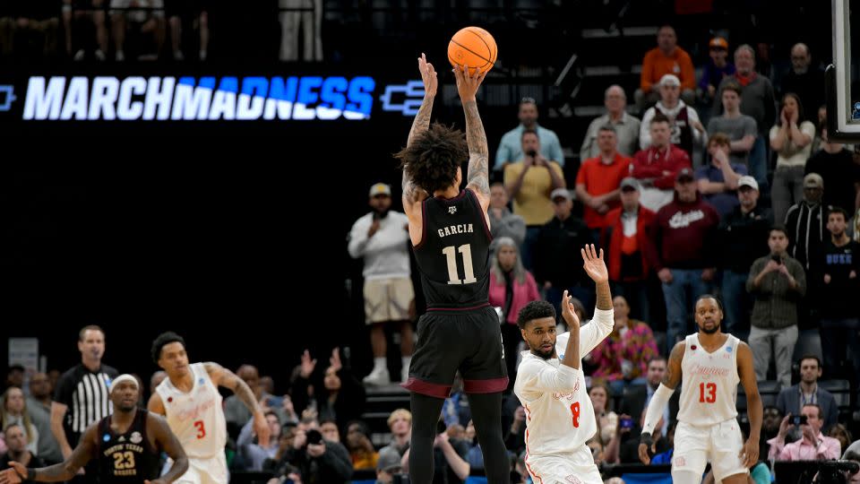 Garcia's buzzer beater tied the score against Houston and sent the game to overtime. - Brandon Dill/AP