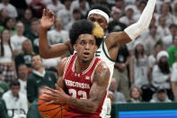 Wisconsin guard Chucky Hepburn (23) drives during the first half of an NCAA college basketball game against Michigan State, Tuesday, Dec. 5, 2023, in East Lansing, Mich. (AP Photo/Carlos Osorio)