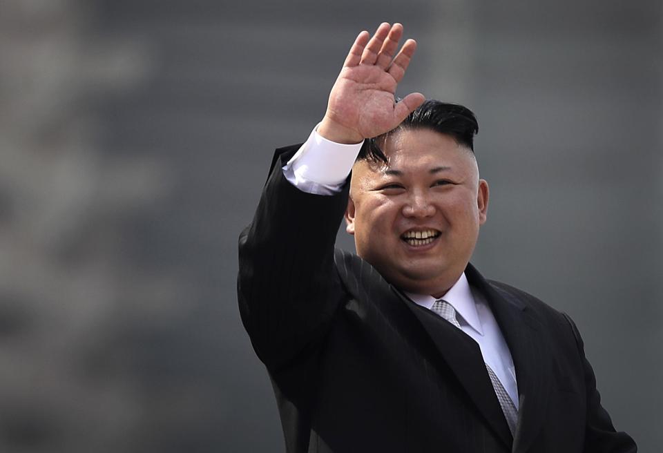 North Korean leader Kim Jong Un waves during a military parade in Pyongyang, North Korea: AP Photo/Wong Maye-E