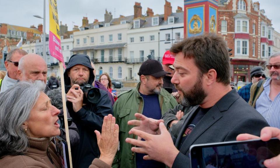 Ukip’s Carl Benjamin is confronted by a protester in Weymouth, Dorset on 17 May.