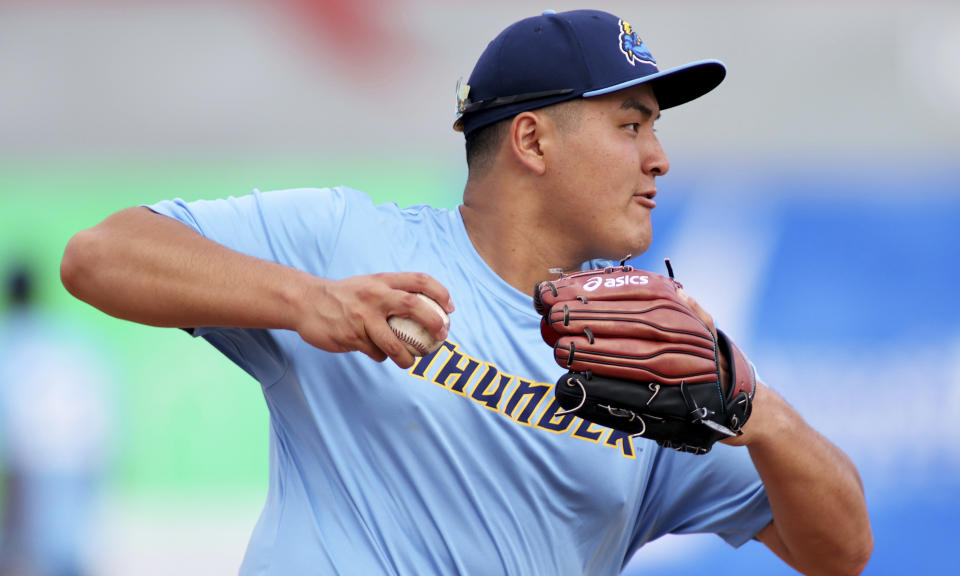 Trenton Thunder first baseman Rintaro Sasaki (49) winds up to throw before a baseball game against the Frederick Keys, Tuesday, June 11, 2024, in Frederick, Md. The 19-year-old prospect will make his U.S. debut Tuesday in the MLB Draft League, playing for the Trenton Thunder of New Jersey along with others hoping to one day develop into major leaguers.(AP Photo/Daniel Kucin Jr.)