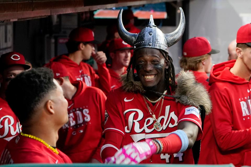 Elly De La Cruz dons the homer horns and celebrates with Noelvi Marte after his blast Tuesday in Cleveland.