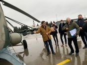 Ukrainian Foreign Minister Dmytro Kuleba and EU's foreign policy chief Josep Borrell board a helicopter at the airport in Kharkiv