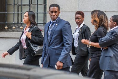 Baltimore City State's Attorney Marilyn Mosby (L) leaves the courthouse after the first day of pretrial motions for six police officers charged in connection with the death of Freddie Gray in Baltimore, Maryland September 2, 2015. REUTERS/Bryan Woolston