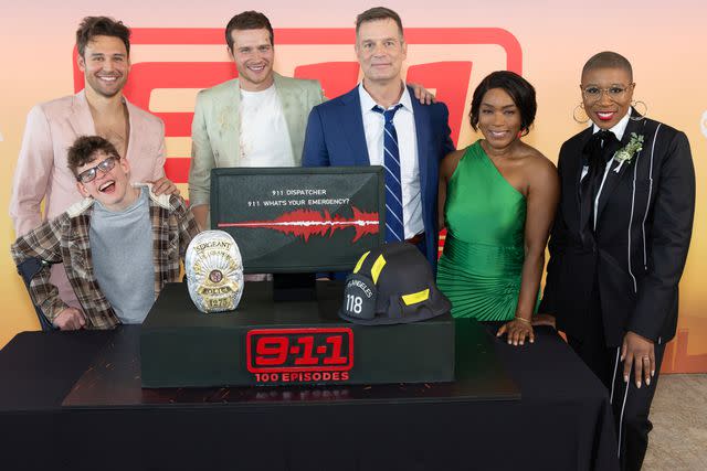 <p>Disney/Frank Micelotta</p> Ryan Guzman, Gavin McHugh, Oliver Stark, Peter Krause, Angela Bassett, and Aisha Hinds celebrate the 100th episode of '9-1-1.'