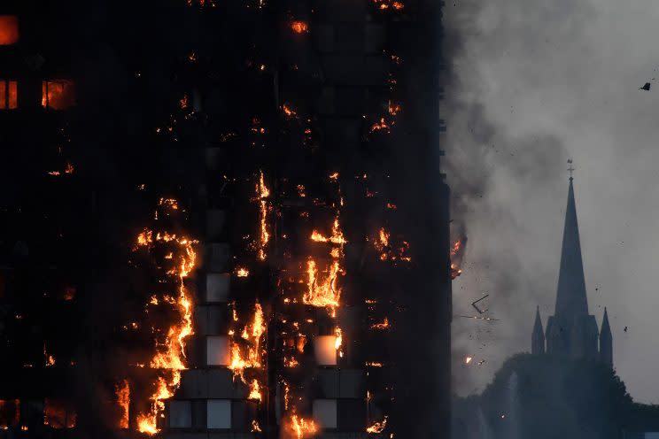 Flames and smoke billow as firefighters deal with a serious fire in a tower block at Latimer Road in West London, Britain June 14, 2017. (Toby Melville/Reuters)