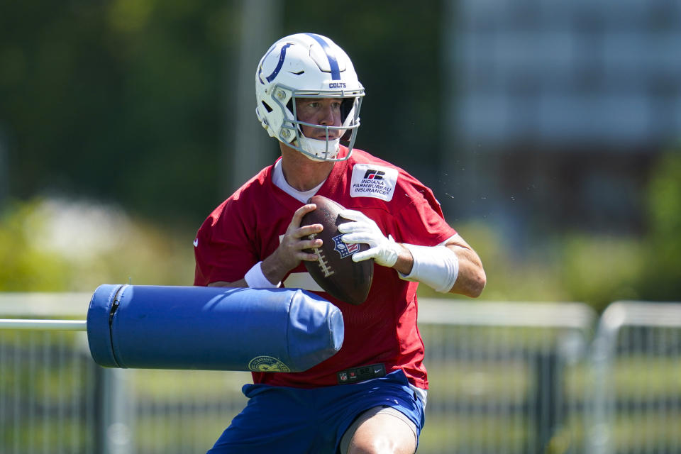 Indianapolis Colts quarterback Matt Ryan throws during practice at the NFL team's football training camp in Westfield, Ind., Thursday, July 28, 2022. (AP Photo/Michael Conroy)