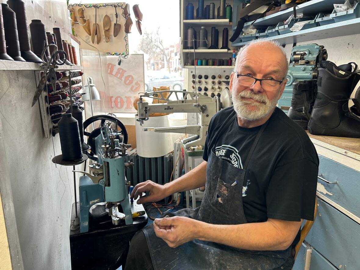 Gilles St-Aubin has been working as a cobbler since 1975, but a newly developed allergy is forcing him to give up his craft.  (Kwabena Oduro/CBC - image credit)