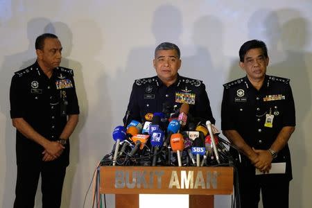 Malaysia's Royal Police Chief Khalid Abu Bakar (C) speaks during a news conference regarding the apparent assassination of Kim Jong Nam, the half-brother of the North Korean leader, at the Malaysian police headquarters in Kuala Lumpur, Malaysia, February 22, 2017. REUTERS/Athit Perawongmetha