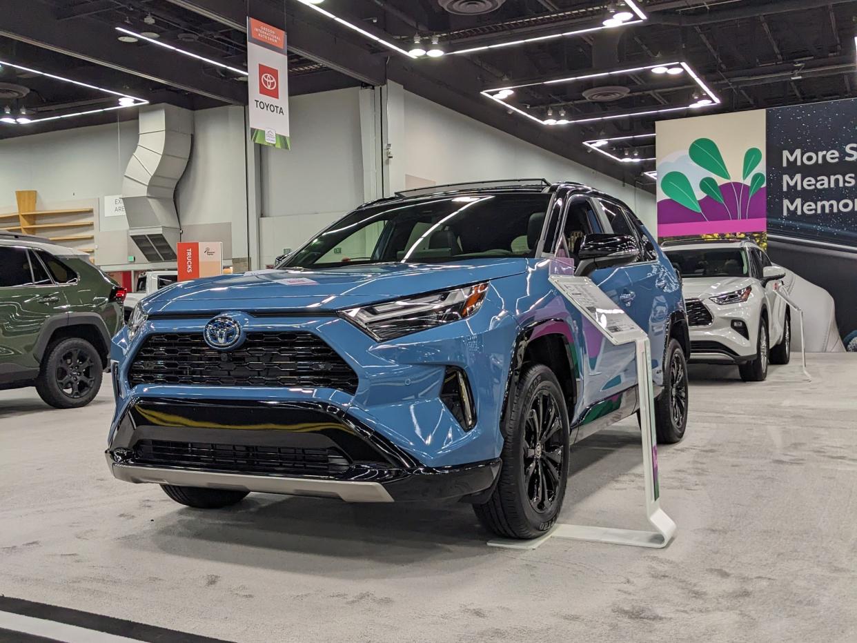 a blue 2024 Toyota RAV4 Hybrid SUV