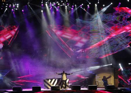 Hip hop artist Akon performs in a concert organized by the Bangladesh Cricket Board (BCB) ahead of the ICC World Twenty20 cricket tournament in Dhaka March 13, 2014. REUTERS/Andrew Biraj