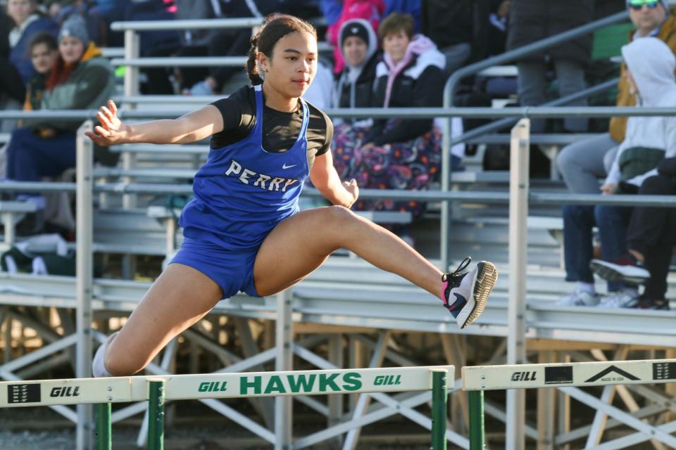 A Perry runner competes during the Cavanaugh Relays on Thursday, April 4, 2024, at Hawk Stadium in Woodward.